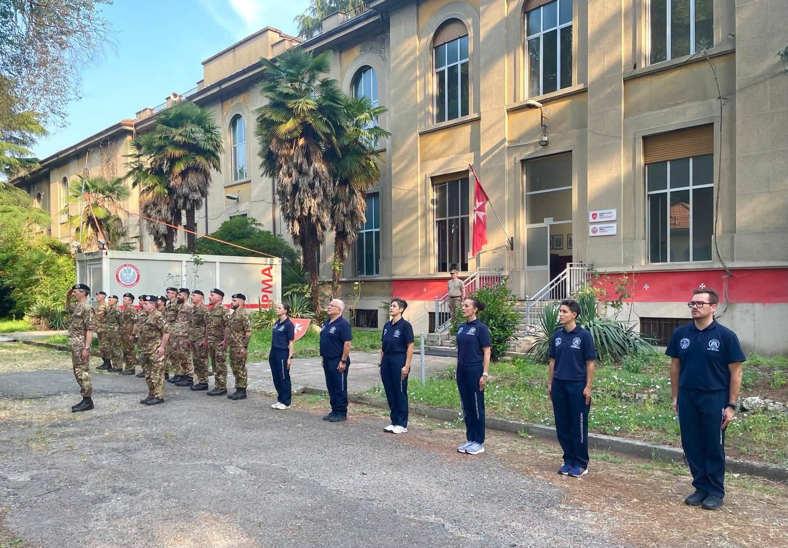 AREMT European Office — Military and EMS personnel parade at Order of Malta facility